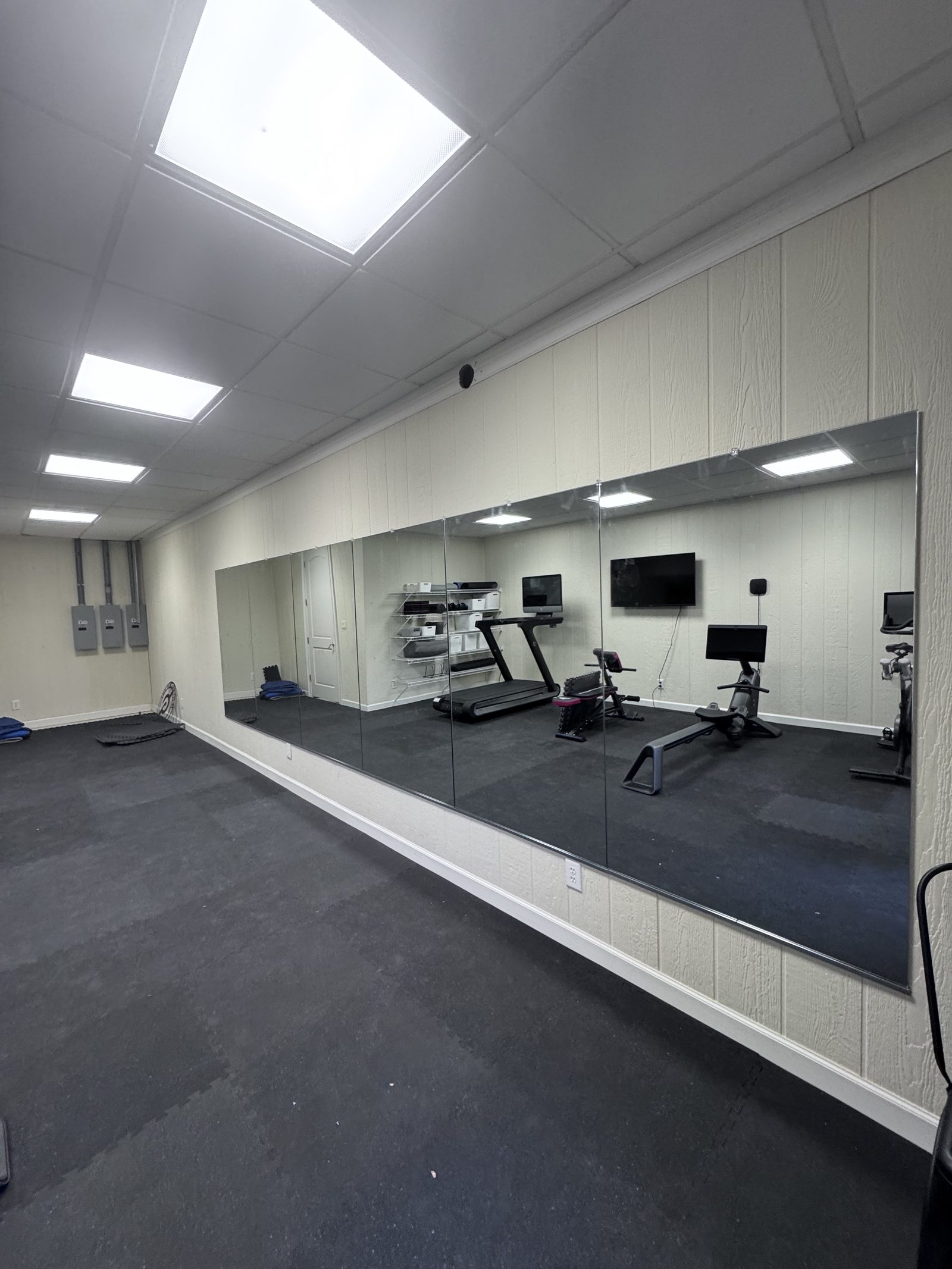 Corporate gym mirror wall